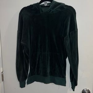 green velvet hoodie small hole by the hood that can be sowed
